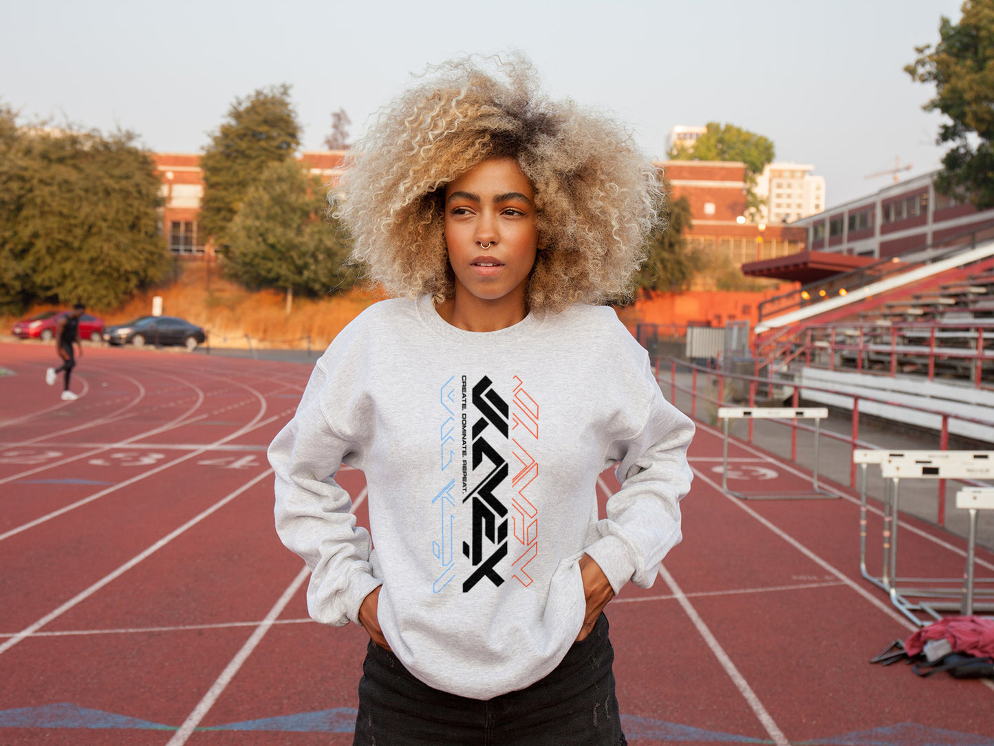 a lady wearing a white Kavex sweater